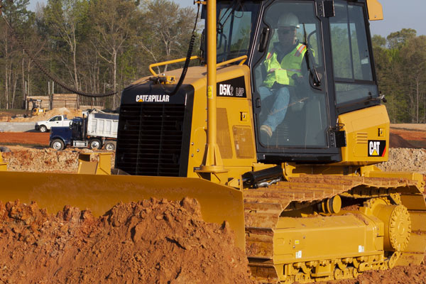 D5K Cat Dozer Pushing Dirt