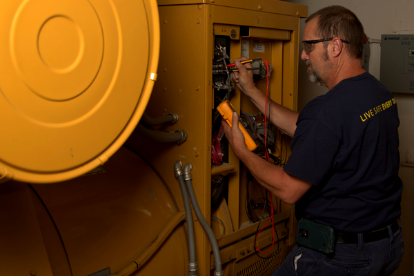 Yancey Technician Performing Inspection & Testing on Generator