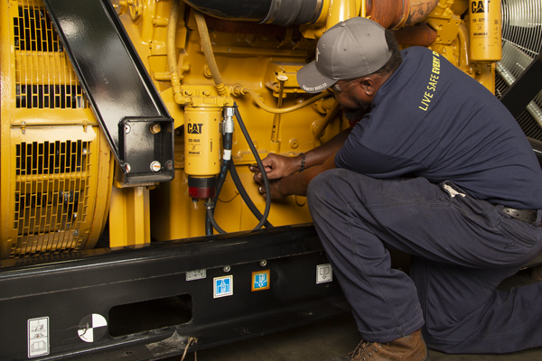 Yancey Technician Working on Generator