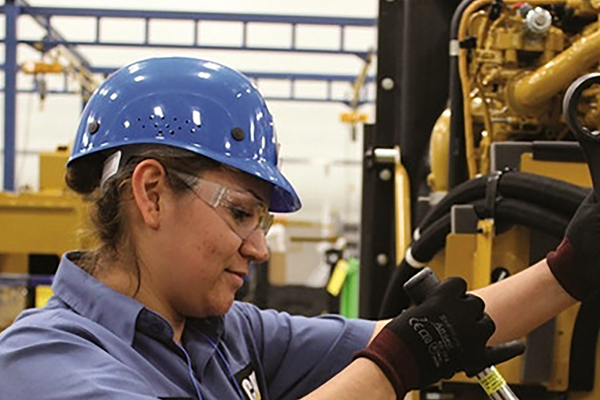 Yancey Technician Performing Preventive Maintenance on Engine