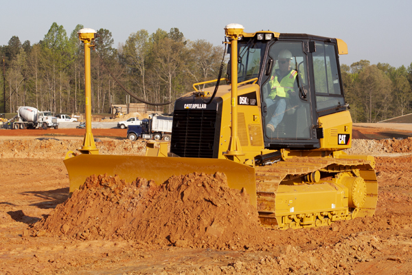 Cat D5K Dozer Pushing Dirt