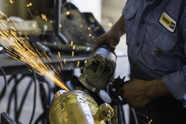 Yancey Technicians Grinding Component