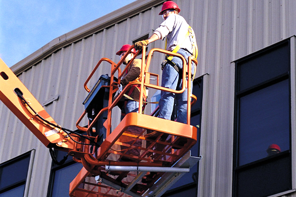 Window Glaziers Using JLG SkyGlazier Boom Lift