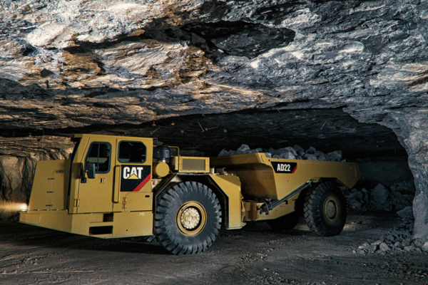 articulated truck moving rocks underground